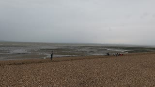 Kit surfer getting their kite ready