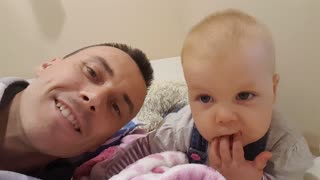 Adorable Baby Mimics Daddy and Giggles