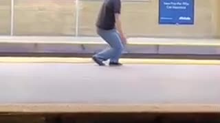 I hate people guy in black shirt blue jeans doing taichi in subway platform
