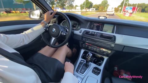 Beautiful girl driving BMW 520d F11 high heeled pumps 👠