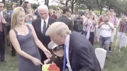 President Trump visits grave of fallen and meets his son