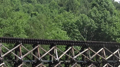 Thomas The Tank Engine Crossing A Railroad Trestle