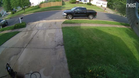Wife sprays her husband coming home from work with the power washer and laughs