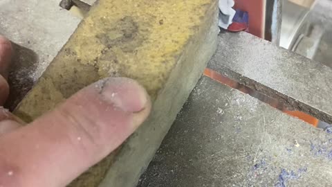 Turning a Nokia 3220 to Dust Using Belt Sander