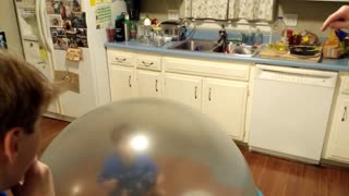 Kid Sits Inside Giant Slime Bubble