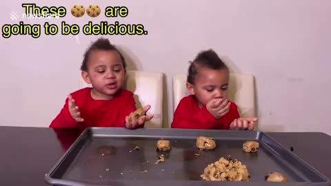 2-year-old twin boys bake cookies in cute video