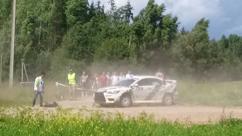 Car Flies After Hitting A Bump In The Road, Barely Misses Cameraman