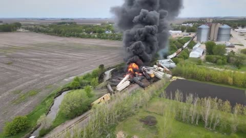 Bird's Eye View Of Black Clouds Engulfing Sky As Derailed Train Catches Fire In Iowa, USA