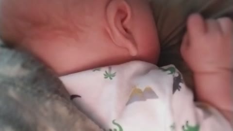 Dad and baby in bedroom nap time turns into breastfeeding attempt