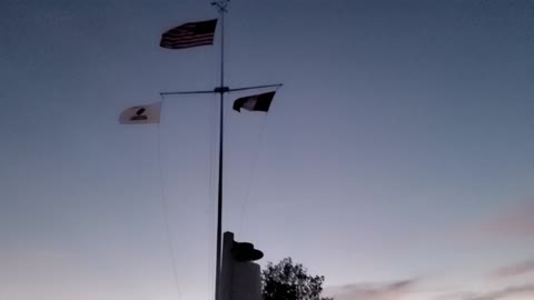 Flags Waiving At A Retired 60 Plus Year Old Coast Gaurd Station
