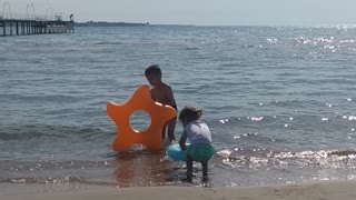 on the shore with children