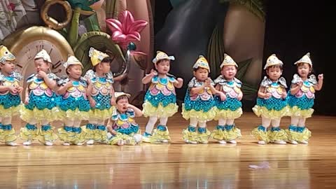 Cute Babies Performing on Stage