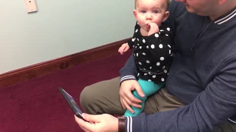 Baby laughs at her own videos!