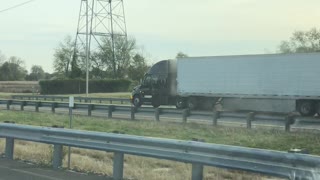 Smoking Semi Continues to Trudge Down Highway