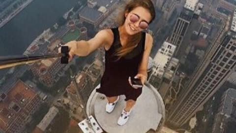 Daredevil Angela Nikolau Takes Dizzying Selfies from Skyscrapers