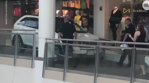 Elderly woman drives car onto second floor of mall, escorted out