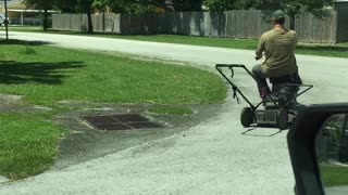 A Clever Way to Mow a Lawn on a Hot Day