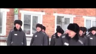Russian Prisoners Take Part In Boot-Throwing Contest