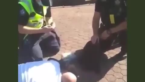 Graphic: Australia Man Suffers Heart Attack While Being Arrested For Not Wearing A Mask