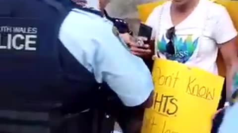 abusive police against mother and child when protest against fake vaccines