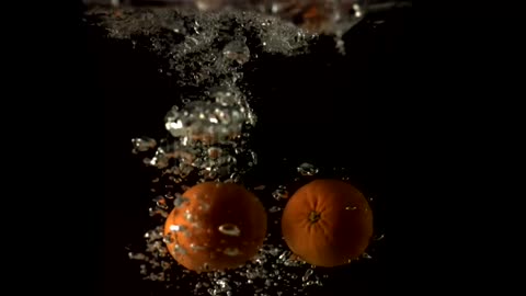 Slowmotion Tangerines underwater