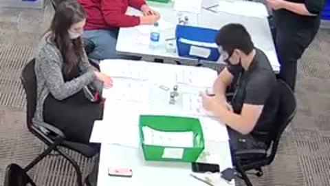 Poll worker illegally filling out ballots -- VOTE FRAUD