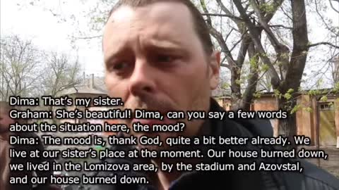 Mariupol residents speak to Graham Phillips. This man's home burnt down.