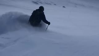 Skier Carves Fresh Powder in Beautiful Switzerland