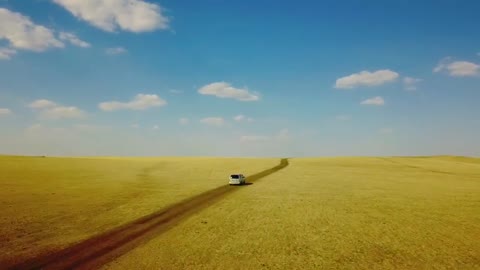 A Car riding on desert