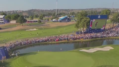 Ryder_Cup_fan_storms_green_and_jumps_in_pond_to_celebrate_Europe's_victory