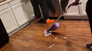 Spray Mop Sends Man Slipping and Sliding