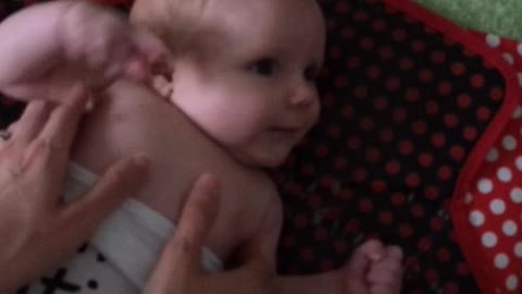 10 week old baby attempts to laugh for the first time