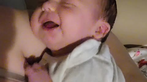 Baby's Reaction to Mom's Kiss