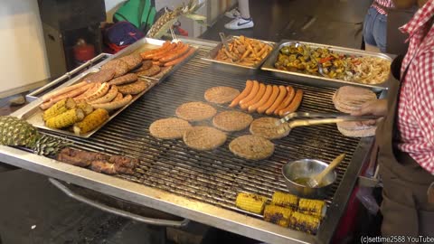 Italy Street Food. Grills with Large Burgers, Sausages, Asado and more Food