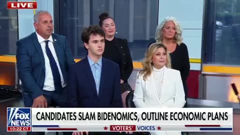 The woman in the white pantsuit is so based!