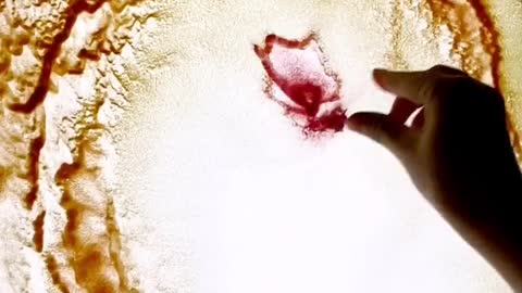 You splash flowers and I splash sand, and then try to make a painting by splashing sand
