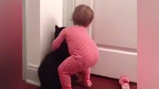 Funny cat play with baby kid