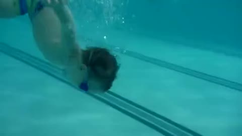 3yo kid diving down to get his toy