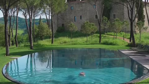 Tuscany's Aquatic Oasis: Dive into the Serenity of Nature's Swimming Pool