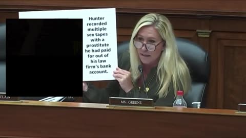 Marjorie Taylor Greene displays images of Hunter Biden having sex with hookers