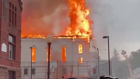 Massachusetts church steeple collapses in fire -