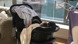 Baby Reacts to Window Cleaner