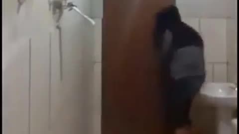 Funny video in a bathroom.