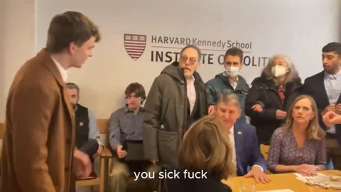 A climate protester gets kicked out after confronting Democrat Senator Joe Manchin