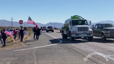 Freedom Convoy USA - Supporters gathered on the side of the highway, briefly blocking traffic on Arizona State Route 68 as trucks and passenger vehicles in the convoy headed out from Golden Valley