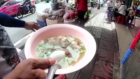 COVID deaths rock Bangkok's famous food stalls