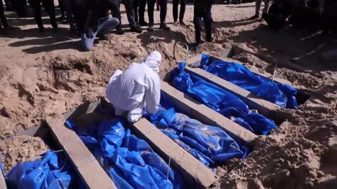 Locals were seen conducting burials in a mass grave in Rafah, Palestine