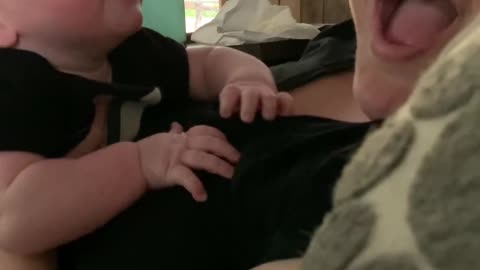 Cute baby talking to his mom first time