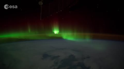 Flying through an Aurora in orbit