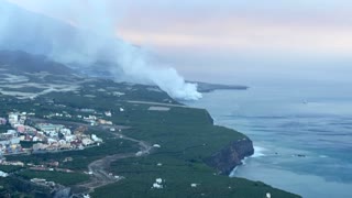 Spanish volcano flows into the morning sea